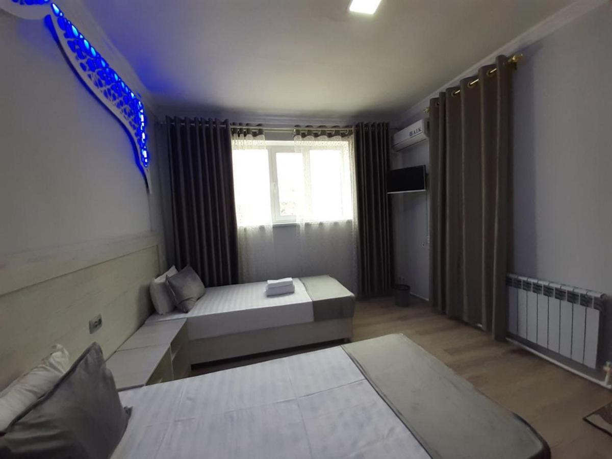 Hotel Rizqiro'Z Boutique Bucara Quarto foto